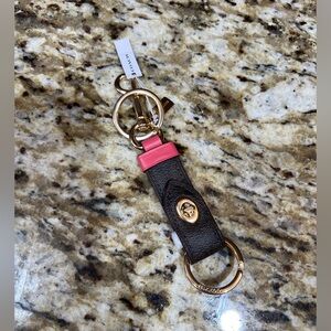 Coach Brown, w/black iconic “C” valet keychain
